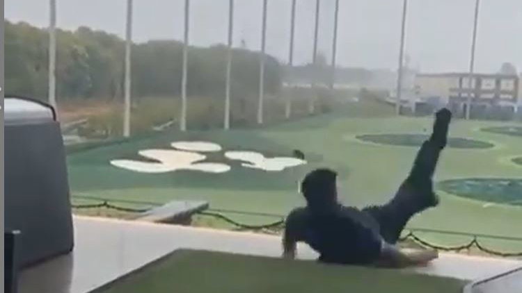 Golfer has absolute NIGHTMARE after topping ball on driving range and slipping!